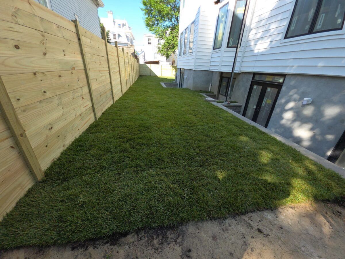 Completed Smithtown sod installation project showing a fresh residential Long Island lawn.